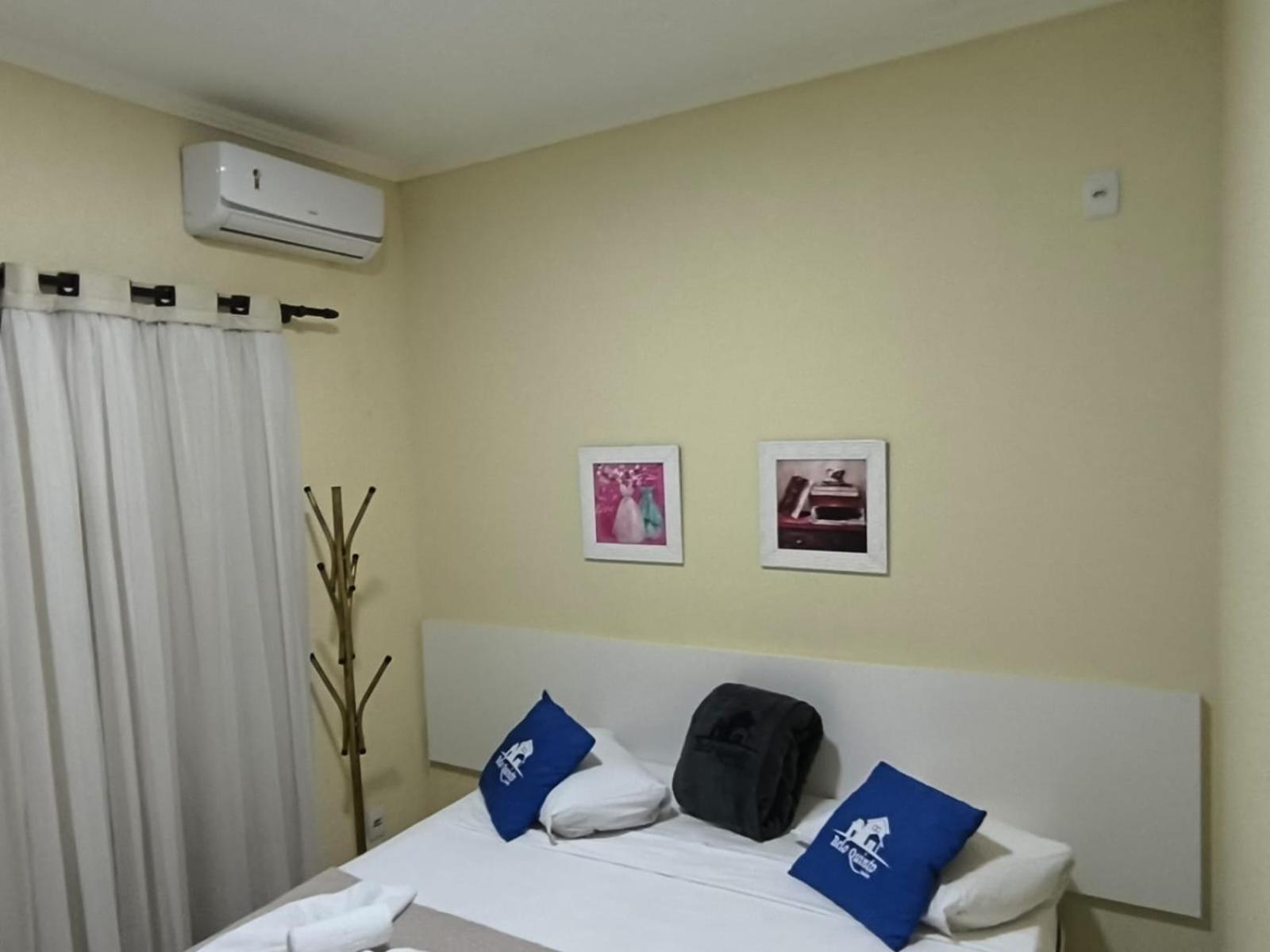 Quarto em Acomodações Particulares Suítes Belo Quinto *