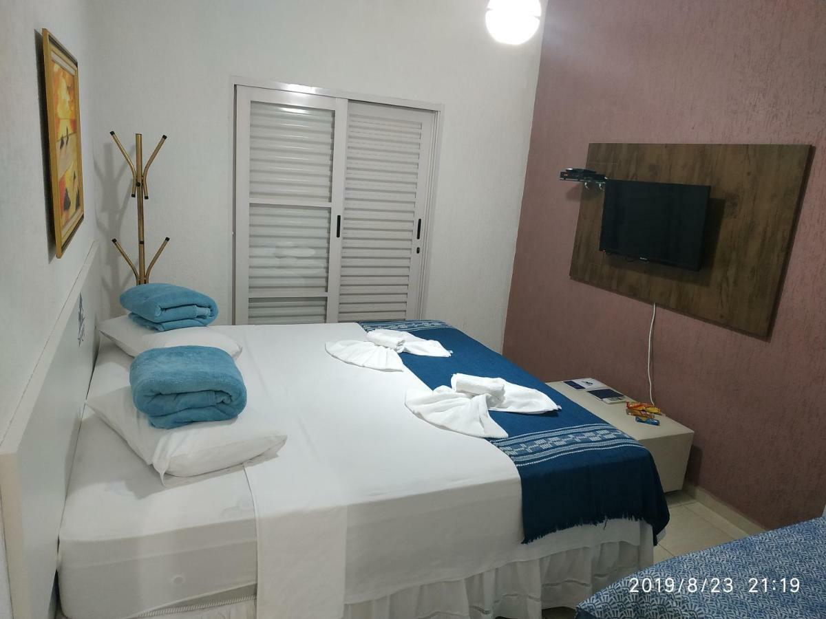 Quarto em Acomodações Particulares Suítes Belo Quinto *